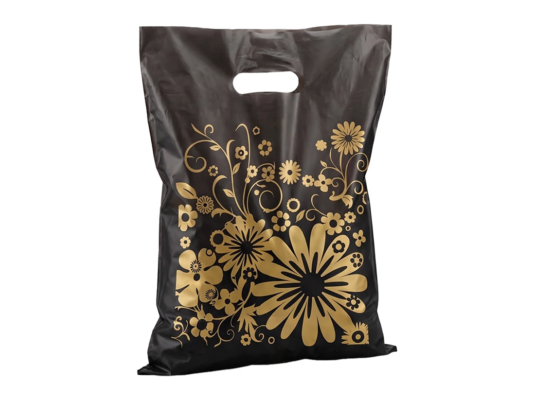 Printed Punched Handle Bags&nbsp;-⁠&nbsp;Black
26 x 38&nbsp;cm